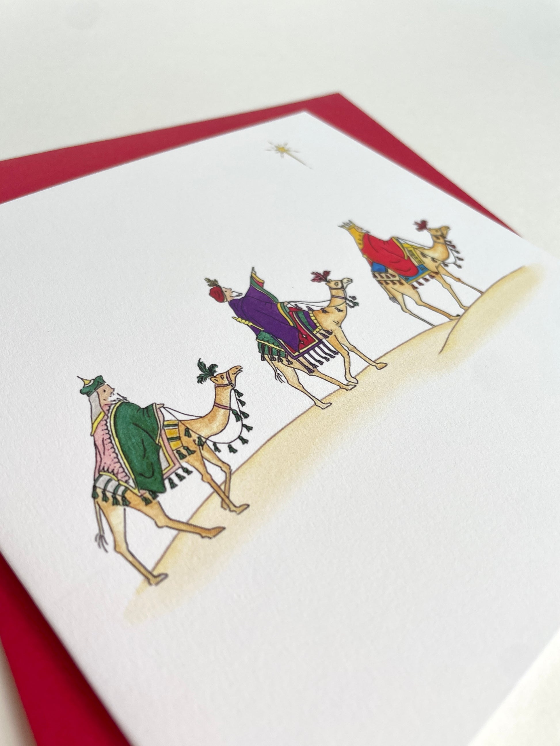Highlights soft texture for lovely quality 300gsm matt cardstock with image of three kings dressed in rich jewel colours. Printed in the UK