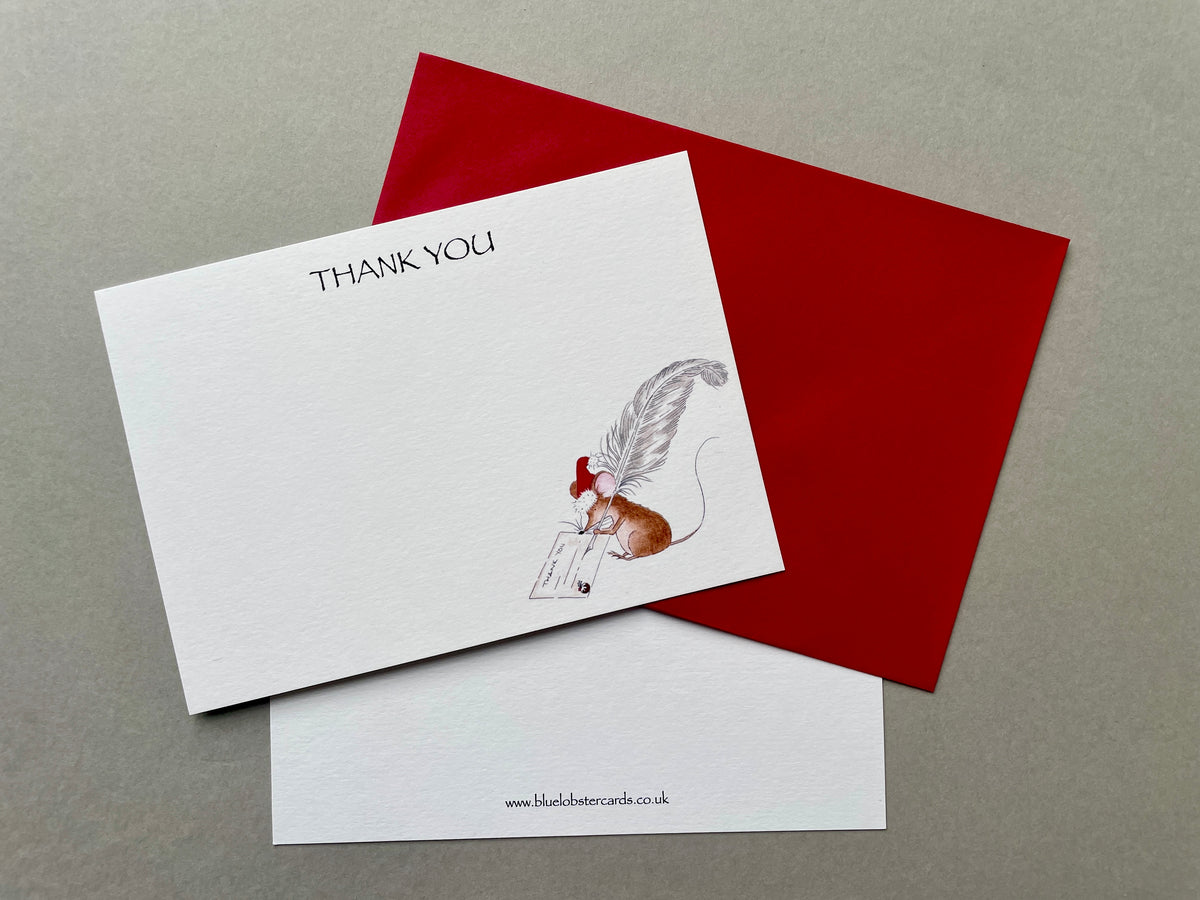 A6 Christmas Thank You card with Christmas mouse and feather watercolour illustration and red envelope on grey background. Image shows reverse of postcard with BLue Lobster Cards website address in tiny print at bottom. 