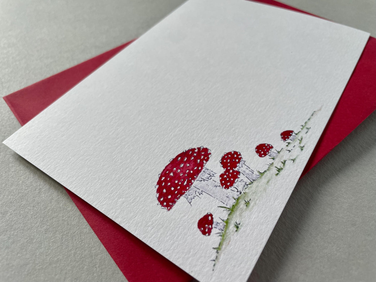 Fine quality matt uncoated cardstock with watercolour illustration of fly-agaric toadstools