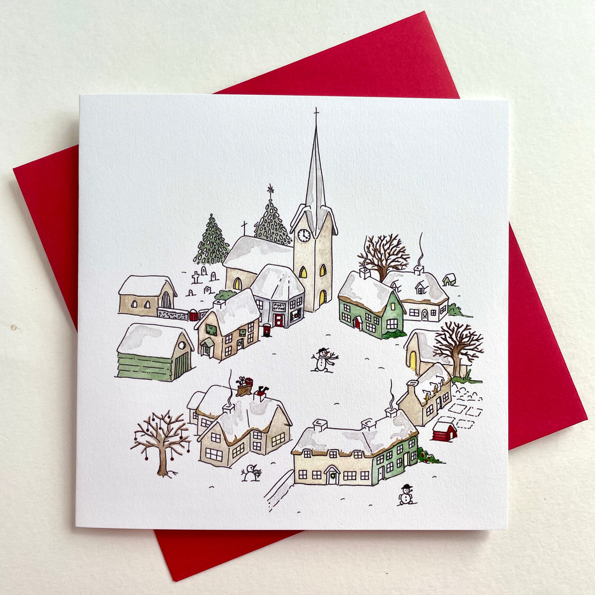 Shows watercolour artwork in greater details and soft white matt textured cardstock - FSC certified, set against christmas red envelope