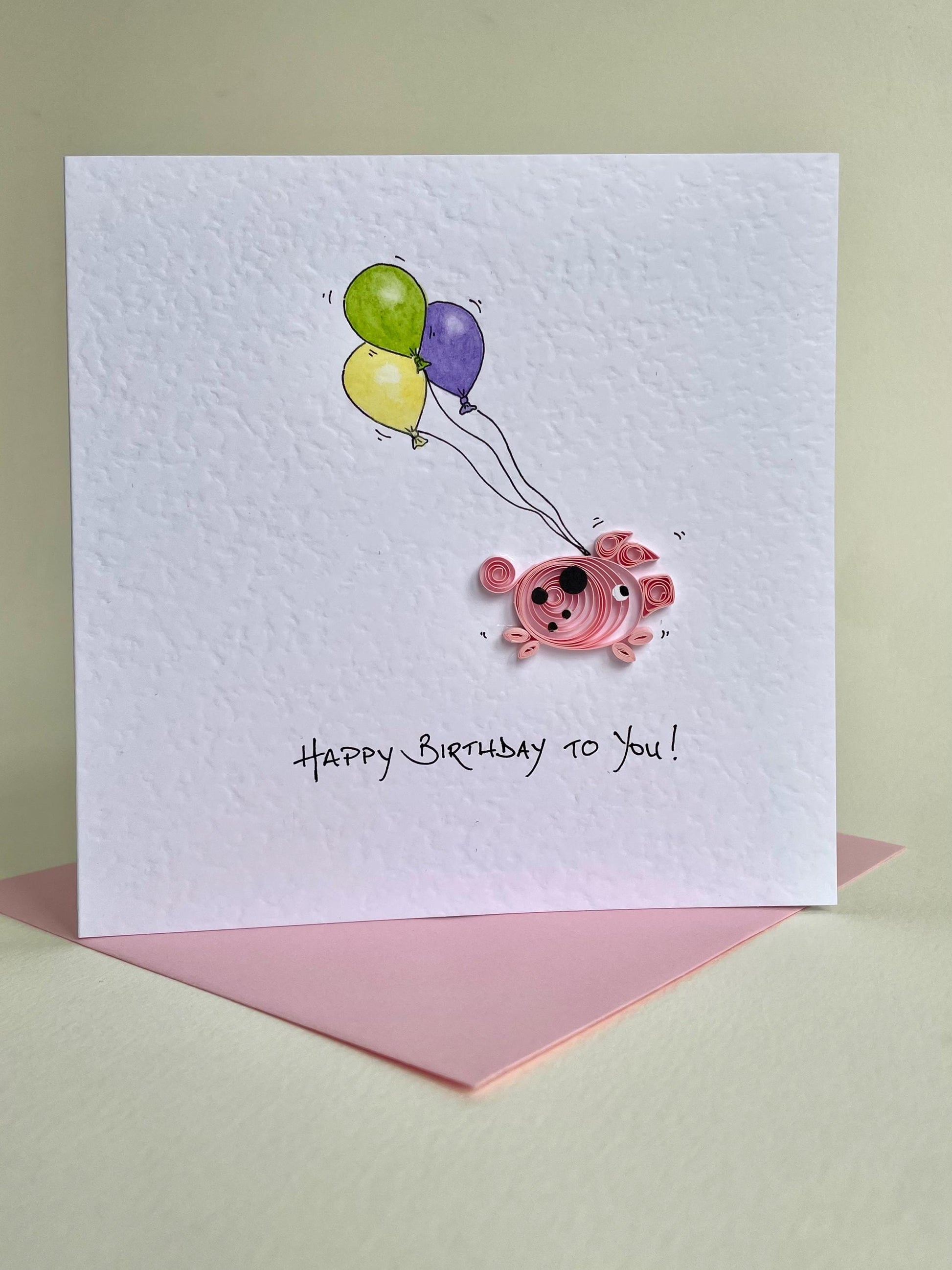 handmade pig birthday card standing with envelope