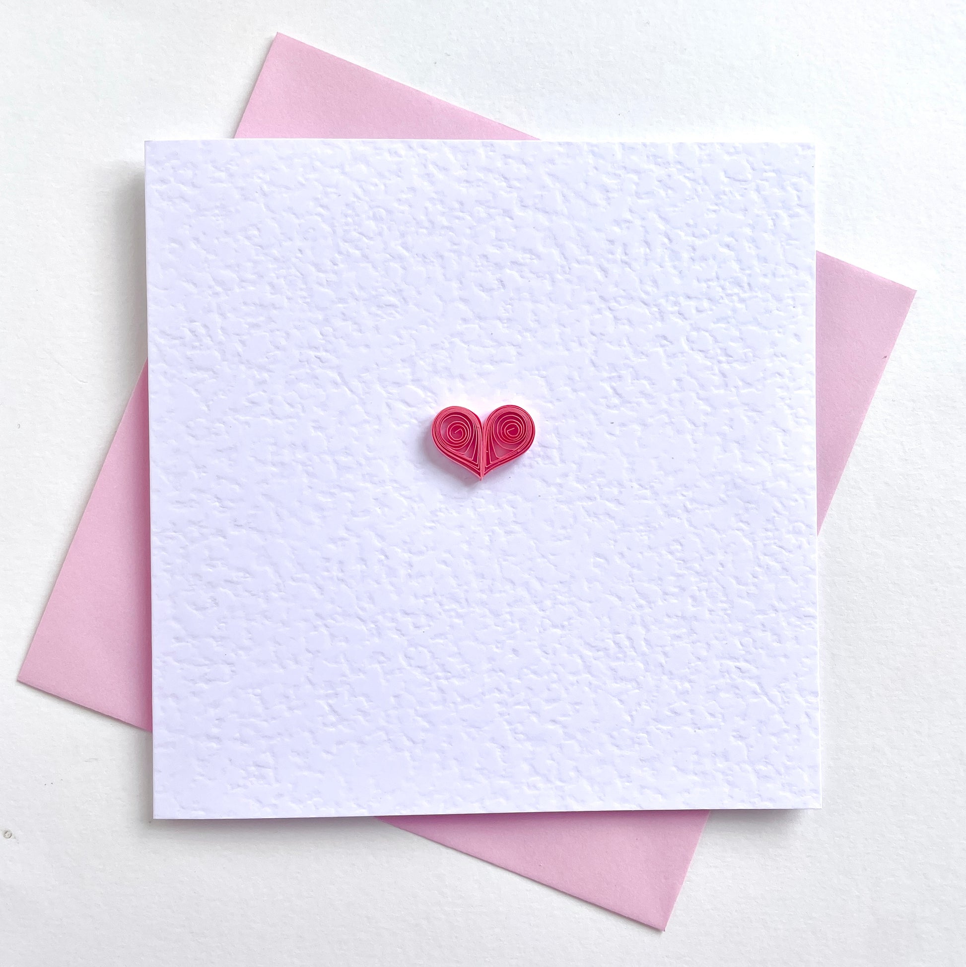 Single quilled heart on hammered card - quilled paper art. Supplied with matching pink envelope