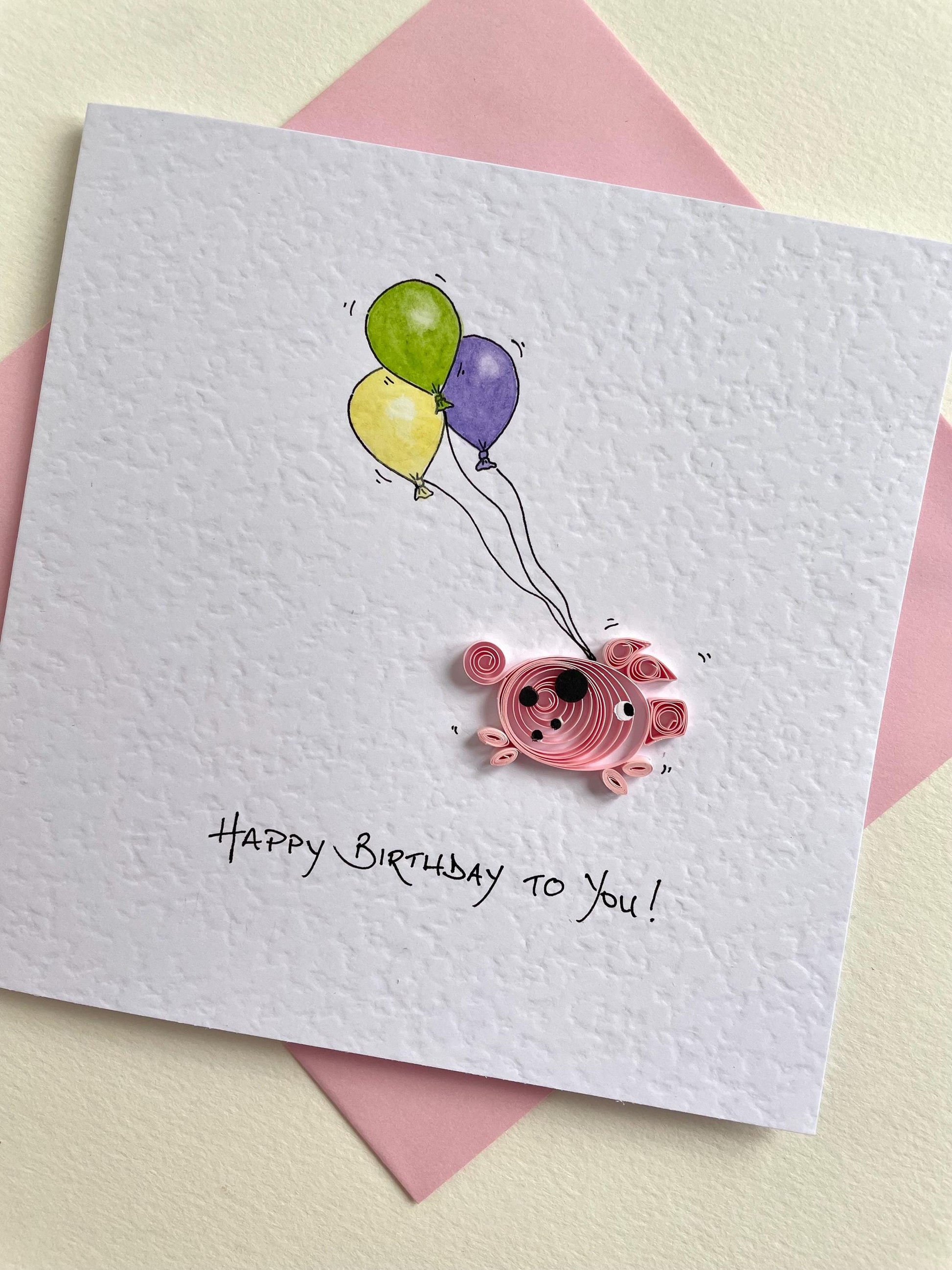 close up of 3D quilled piglet detail on handmade birthday card