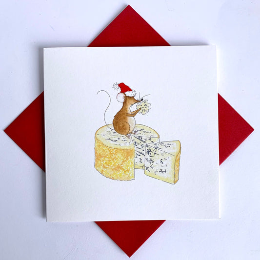 Delightful Animal Charity Christmas card featuring my own watercolour  illustration of a cute Christmas mouse sitting on top of a piece of Stilton cheese. Coordinating red envelopes supplied