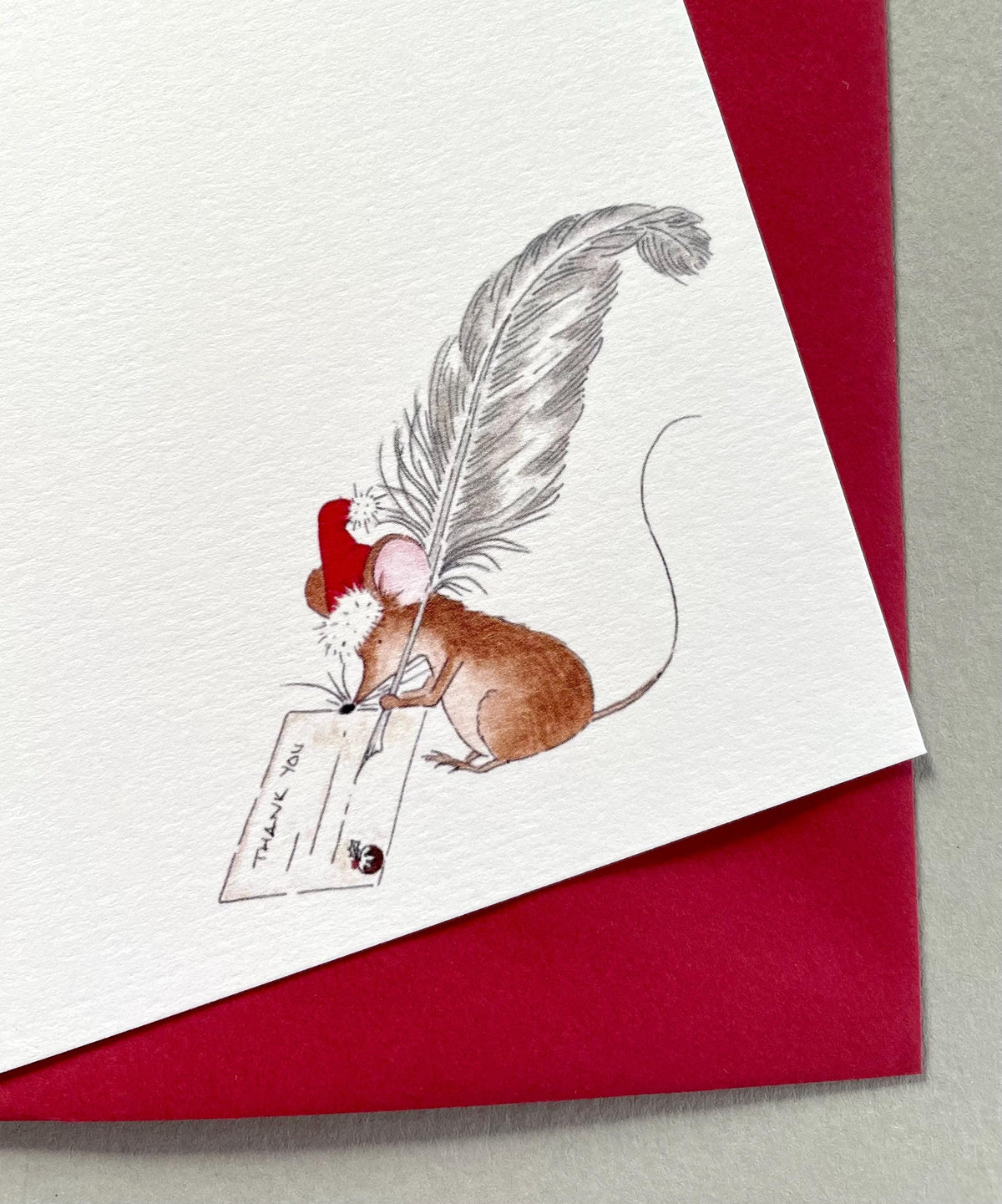 Cloe-up showing detailed image of mouse watercolour with high quality 300gsm matt textured cardstock and red envelope.