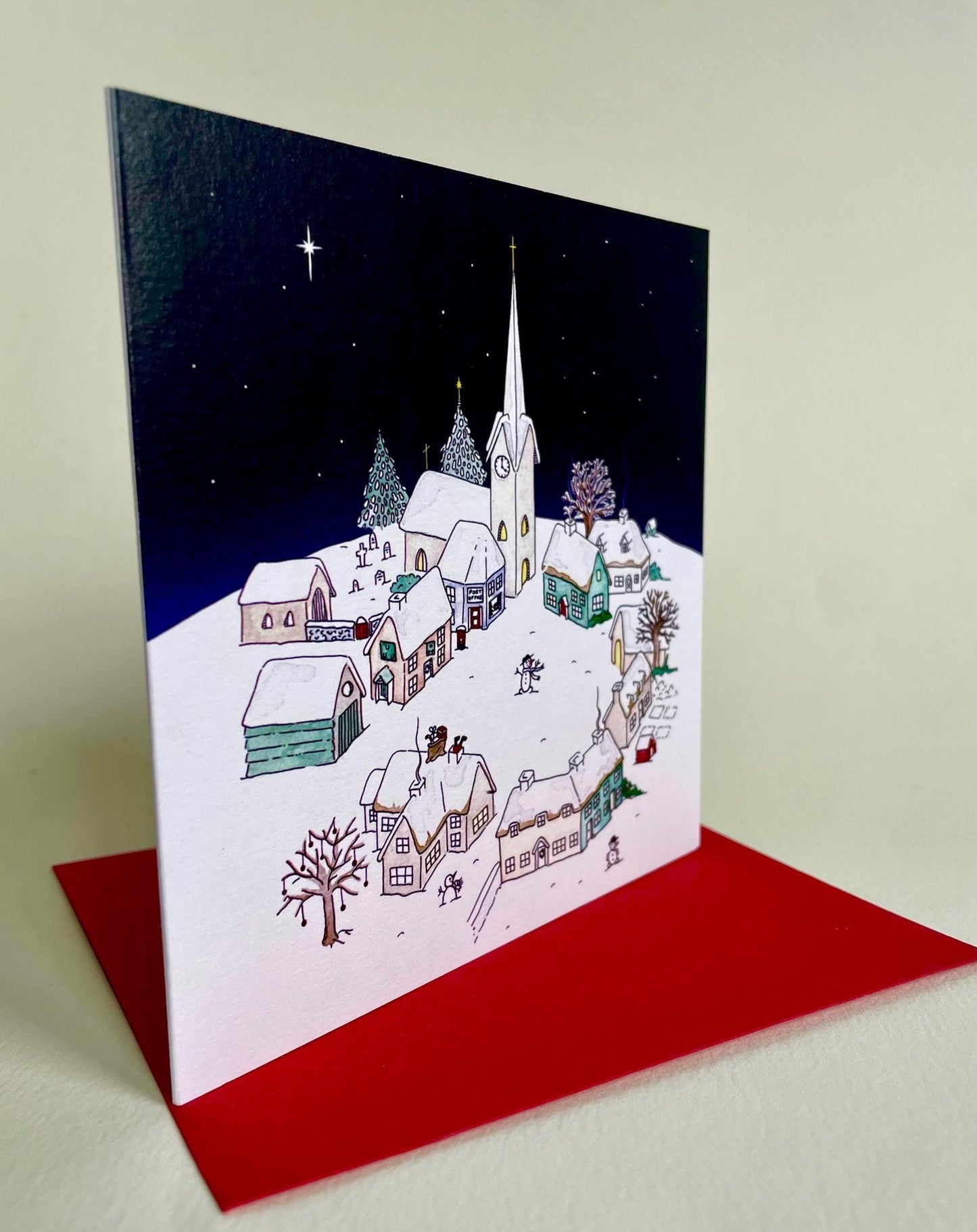 Snowy Village on Christmas Night