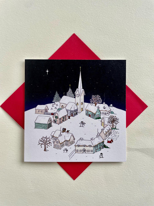 Snowy Village on Christmas Night