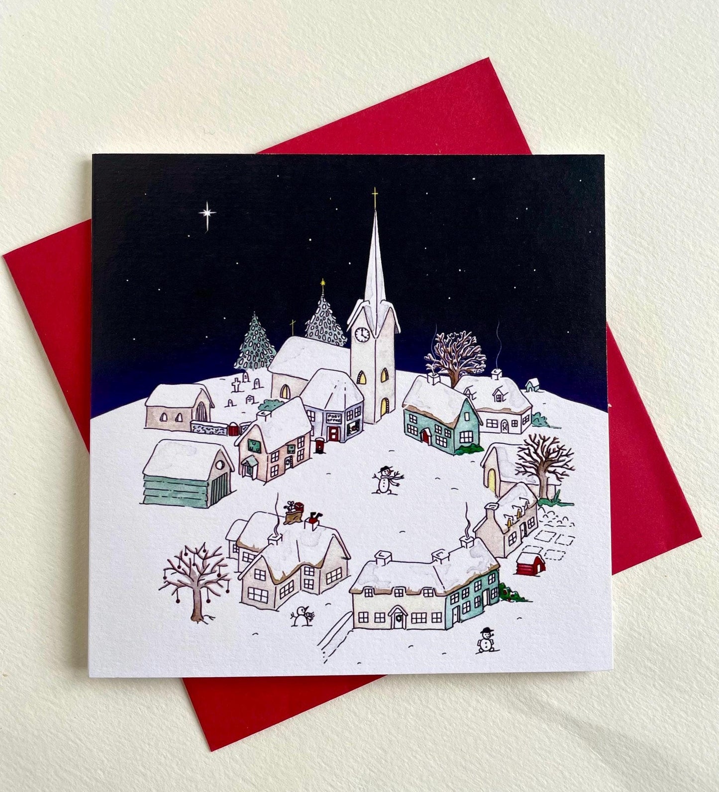 Snowy Village on Christmas Night